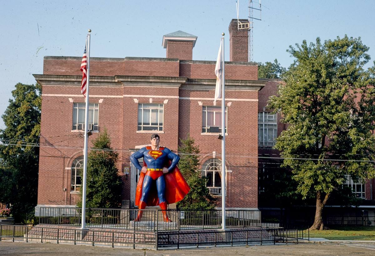 Historic Photo : 1993 Superman statue at Massac County Courthouse, horizontal view, Metropolis, Illinois | Margolies | Roadside America Collection | Vintage Wall Art :