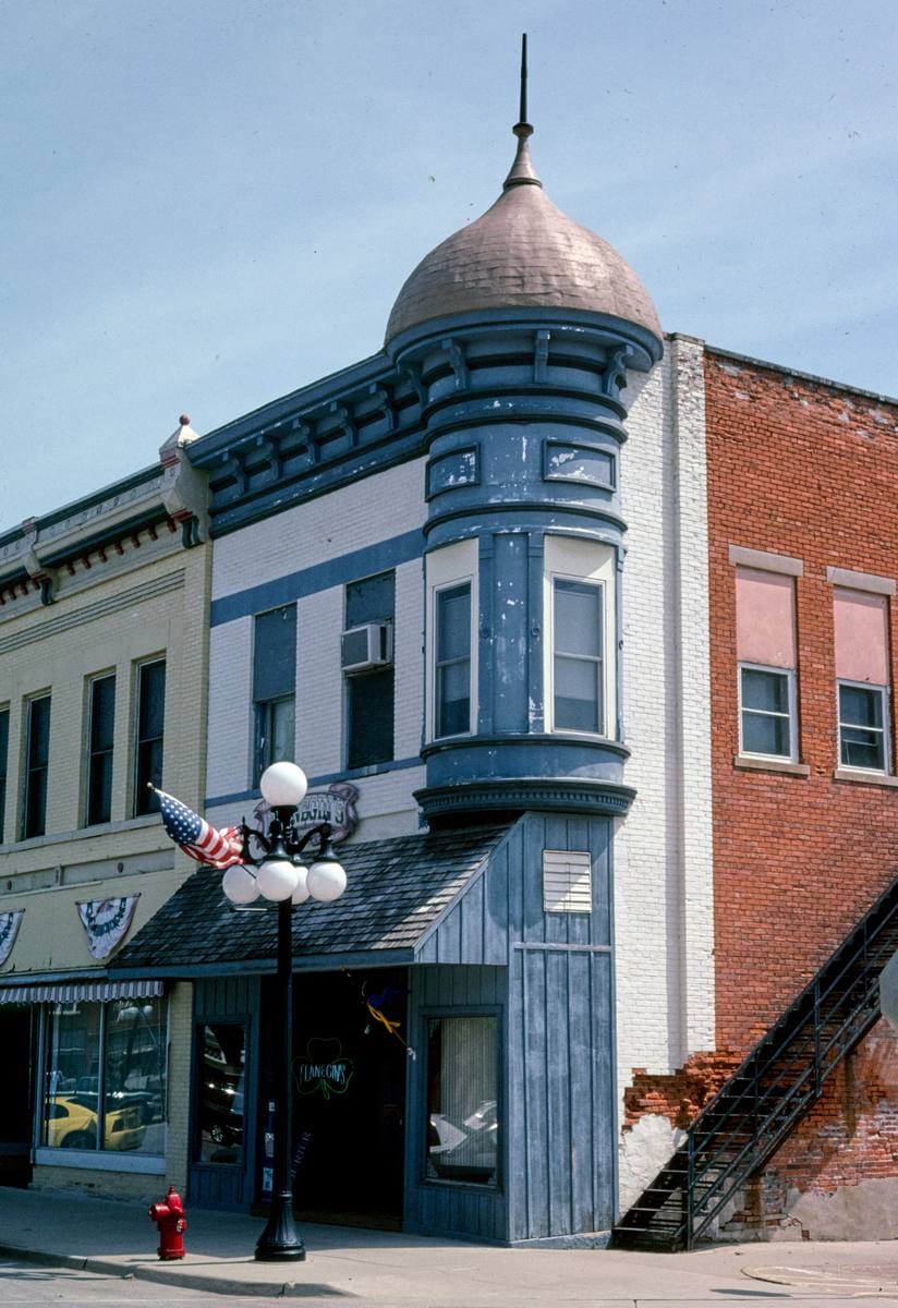 Historic Photo : 2003 Corner Building, Marian (?) and Jefferson Streets, Sigourney, Iowa | Margolies | Roadside America Collection | Vintage Wall Art :