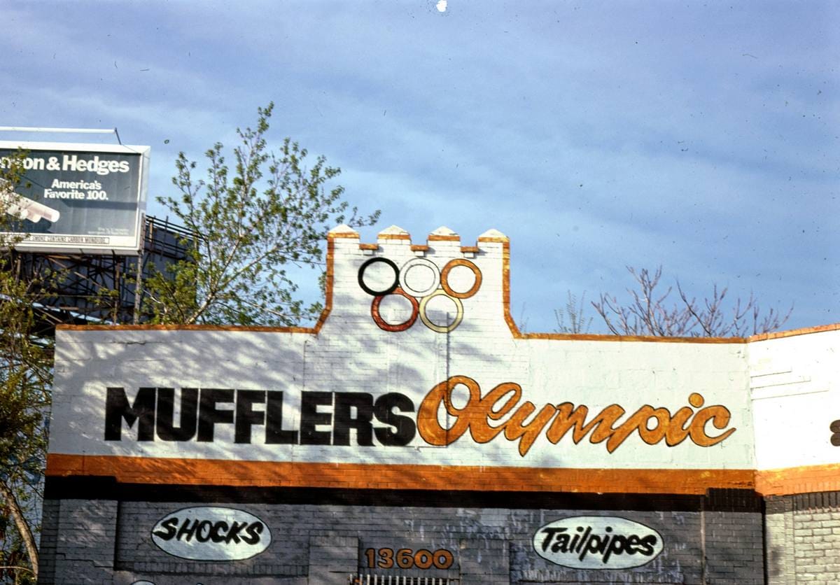 Historic Photo : 1986 Olympic Mufflers (horizontal), 13600 Livernois, Detroit, Michigan | Margolies | Roadside America Collection | Vintage Wall Art :