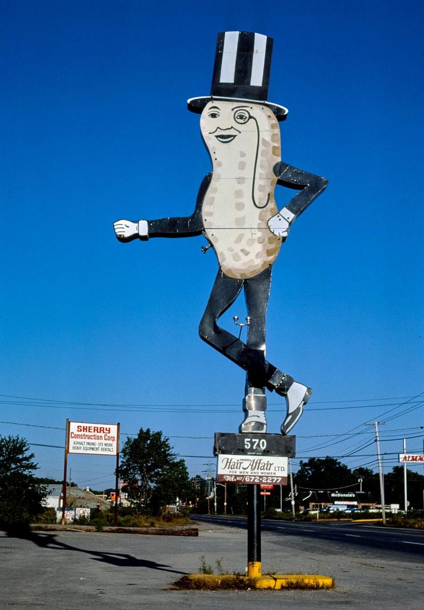 Historic Photo : 1984 Mr. Peanut sign (Hair Affair sign), angle 1, Route 6, Swansea, Massachusetts | Margolies | Roadside America Collection | Vintage Wall Art :