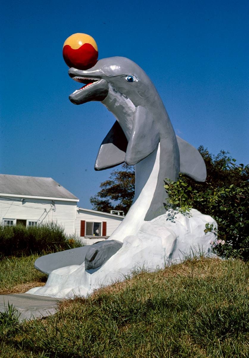Historic Photo : 1984 Aqua Circus dolphin statue, Route 28, Yarmouth, Massachusetts | Margolies | Roadside America Collection | Vintage Wall Art :