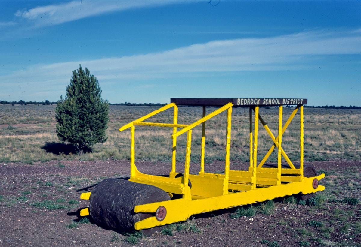Historic Photo : 1987 School bus, Flintstone's Bedrock City, Rts. 64 and 180, Valle, Arizona | Margolies | Roadside America Collection | Vintage Wall Art :