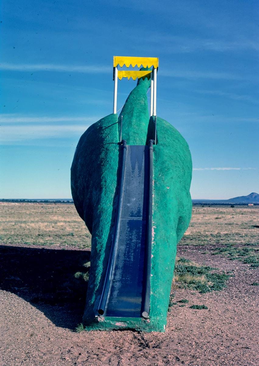 Historic Photo : 1987 Dinosaur slide (back), Bedrock City, Rts. 64 and 180, Valle, Arizona | Margolies | Roadside America Collection | Vintage Wall Art :