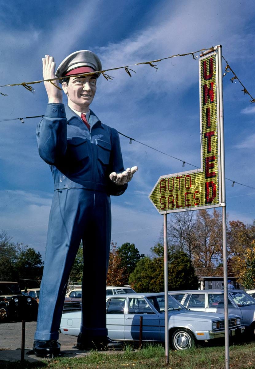 Historic Photo : 1987 United Auto Sales statue, Route 64, Clarksville, Arkansas | Margolies | Roadside America Collection | Vintage Wall Art :
