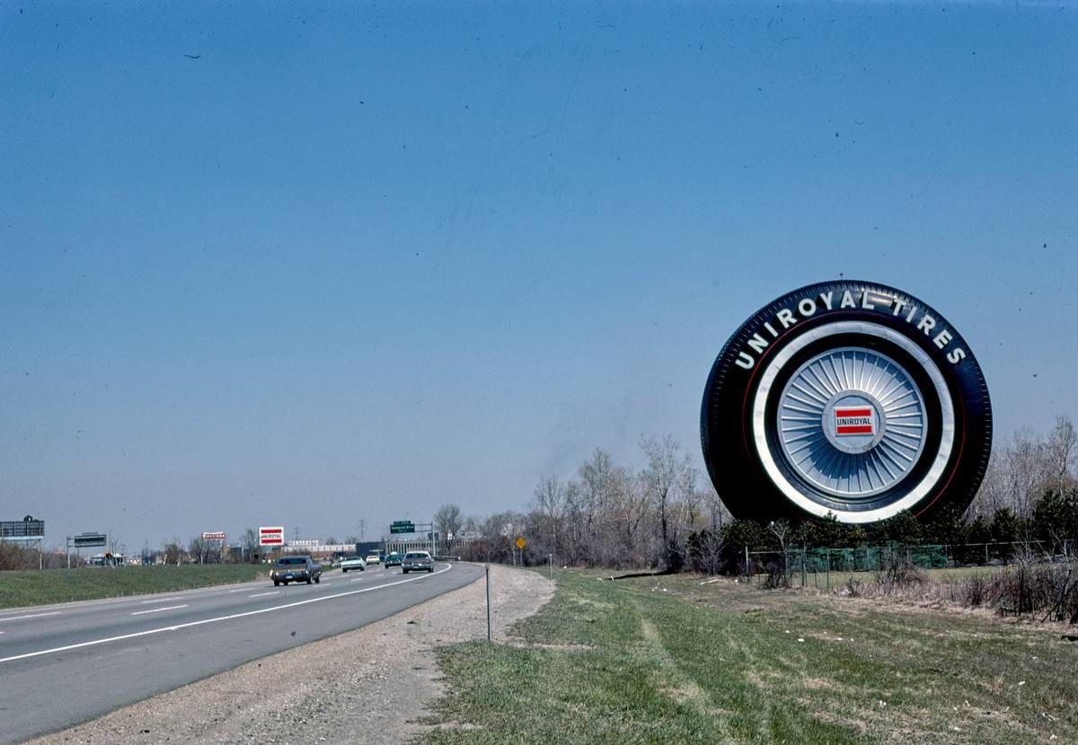 Historic Photo : 1976 Huge Uniroyal tire heading into Detroit, Michigan | Margolies | Roadside America Collection | Vintage Wall Art :