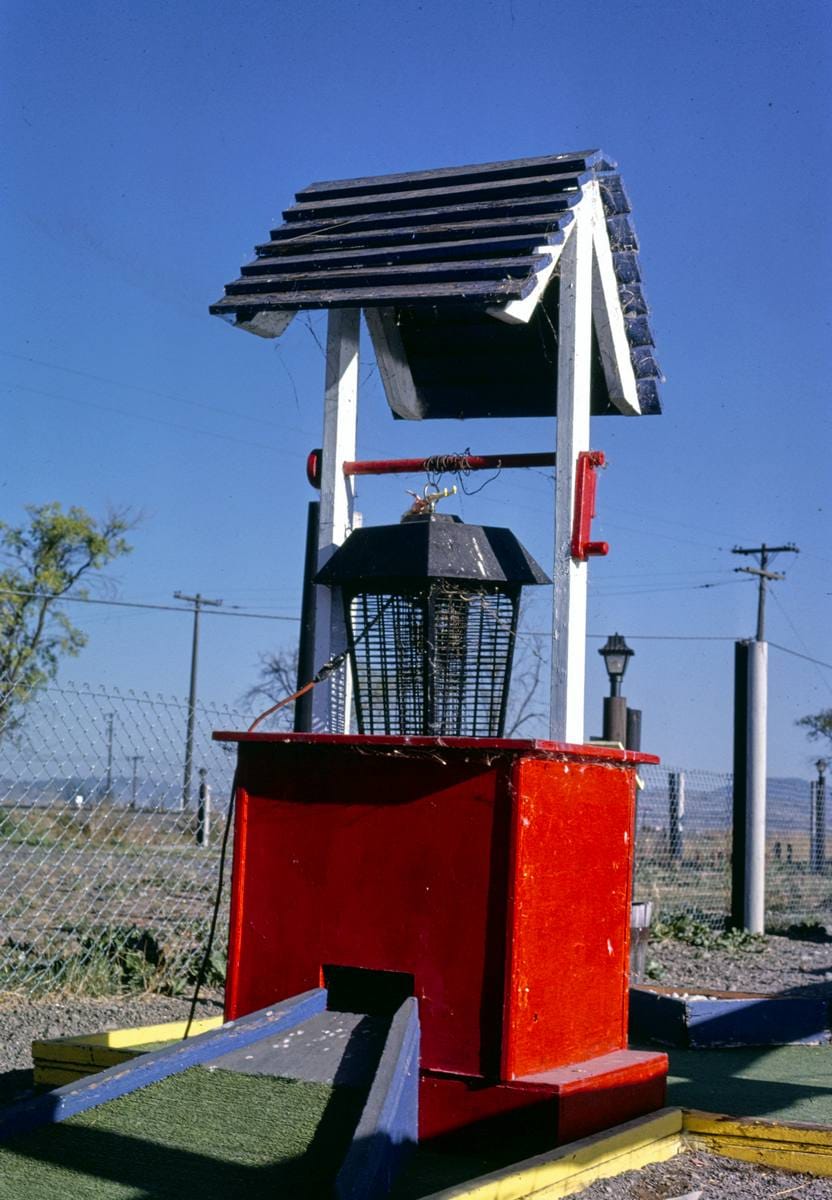 Historic Photo : 1987 Fun Land mini golf, wishing well and bug zapper, Klamath Falls, Oregon | Margolies | Roadside America Collection | Vintage Wall Art :