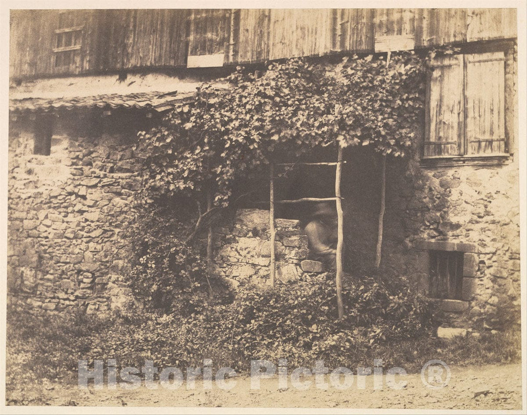 Photo Print : André Giroux - Rustic Building with Man Under Trellis : Vintage Wall Art