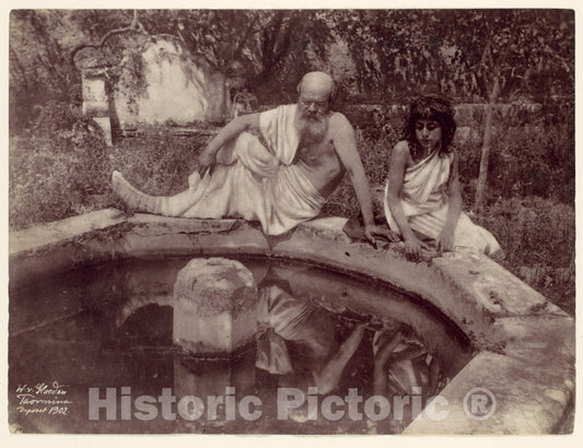 Photo Print : Wilhelm von Gloeden - Elderly Man and Young Boy at Garden Fountain, Sicily, Italy : Vintage Wall Art