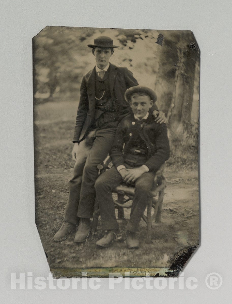 Art Print : Two Young Men Outdoors, One Seated, The Other on The Arm of The Chair - Artist Unknown : Vintage Wall Art