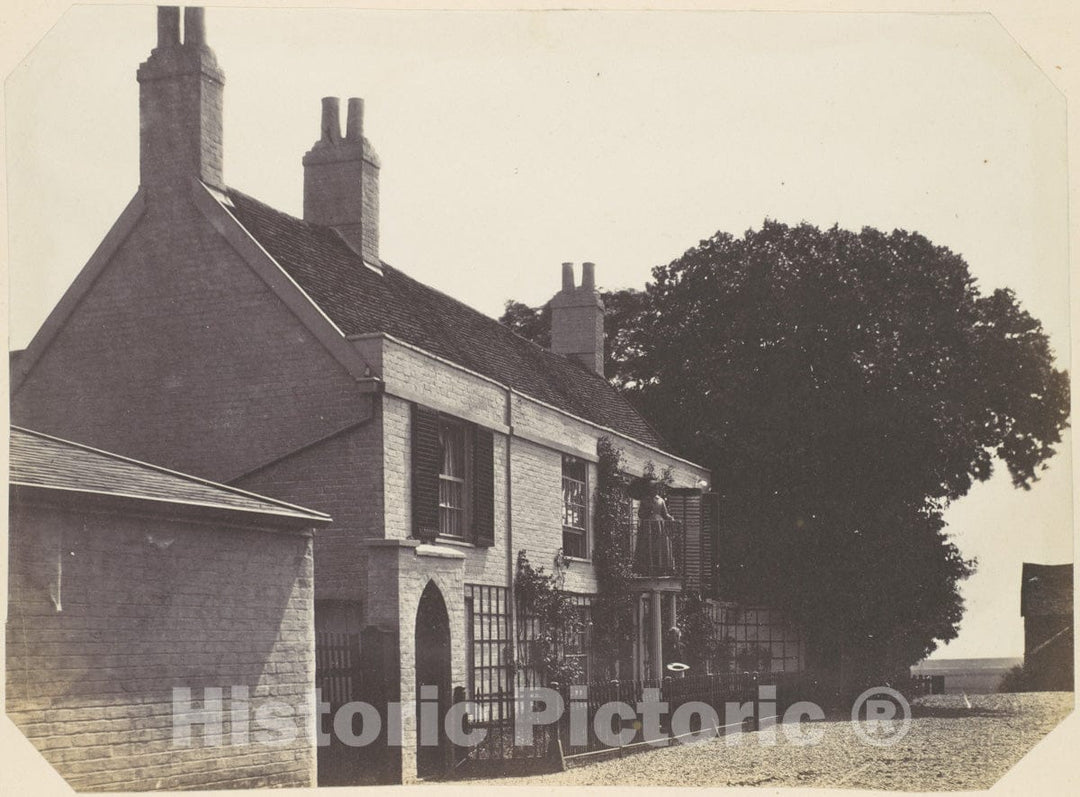 Photo Print : Richard Dykes Alexander - House with Woman on Balcony, Man Standing Below : Vintage Wall Art
