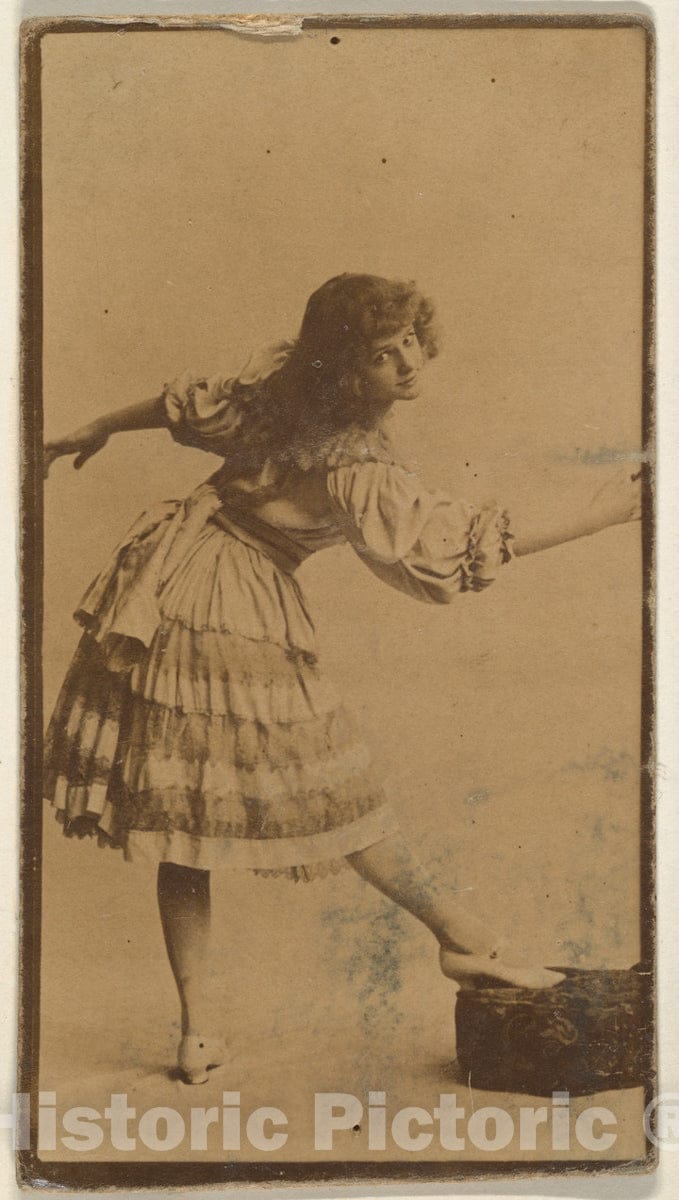 Photo Print : Actress Posing with Foot on Cushion, from The Actresses Series (N668) : Vintage Wall Art