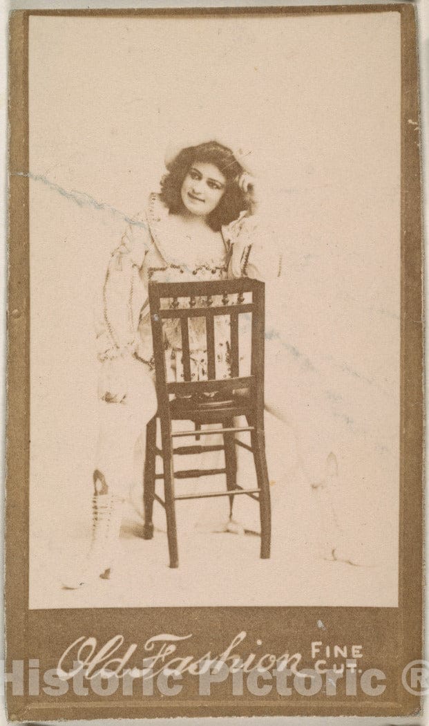 Photo Print : Actress straddling Chair, from The Actresses Series (N664) Promoting Old Fashion Fine Cut Tobacco : Vintage Wall Art