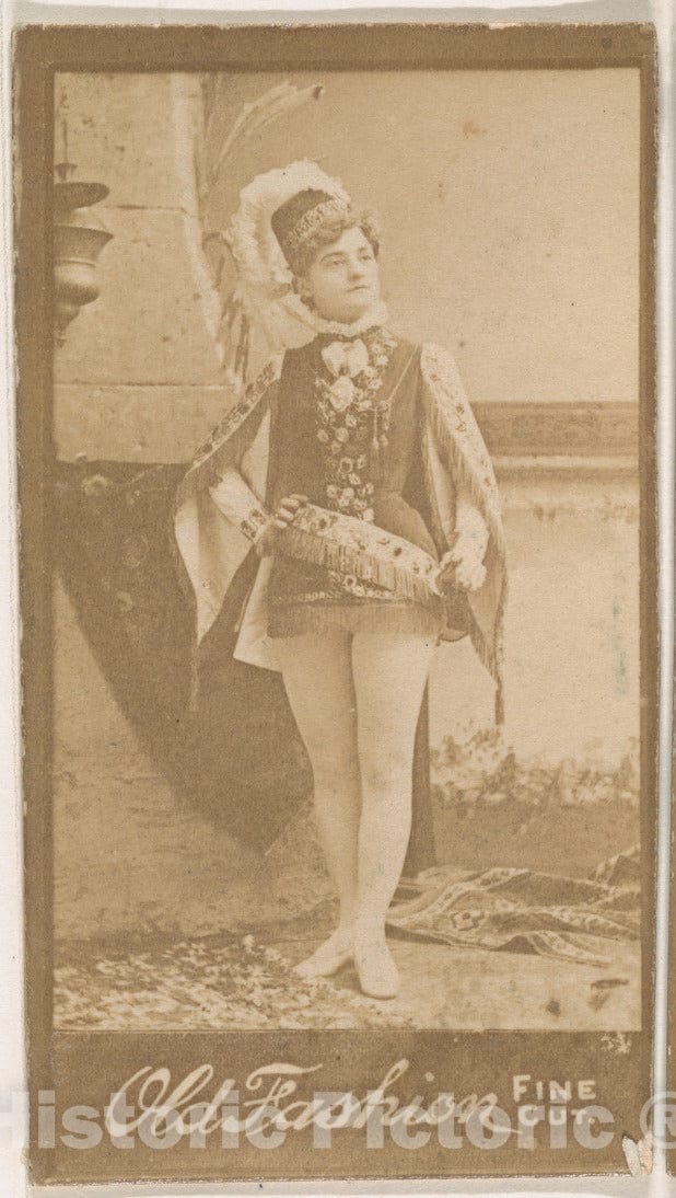 Photo Print : Actress Wearing plumed hat and finged sash, from The Actresses Series (N664) Promoting Old Fashion Fine Cut Tobacco : Vintage Wall Art