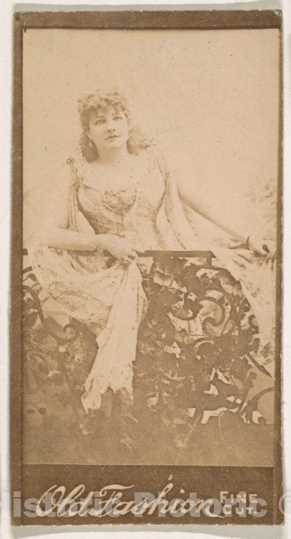 Photo Print : Actress Standing Behind Iron Railing, from The Actresses Series (N664) Promoting Old Fashion Fine Cut Tobacco : Vintage Wall Art