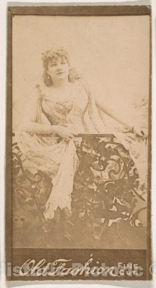 Photo Print : Actress Standing Behind Iron Railing, from The Actresses Series (N664) Promoting Old Fashion Fine Cut Tobacco : Vintage Wall Art