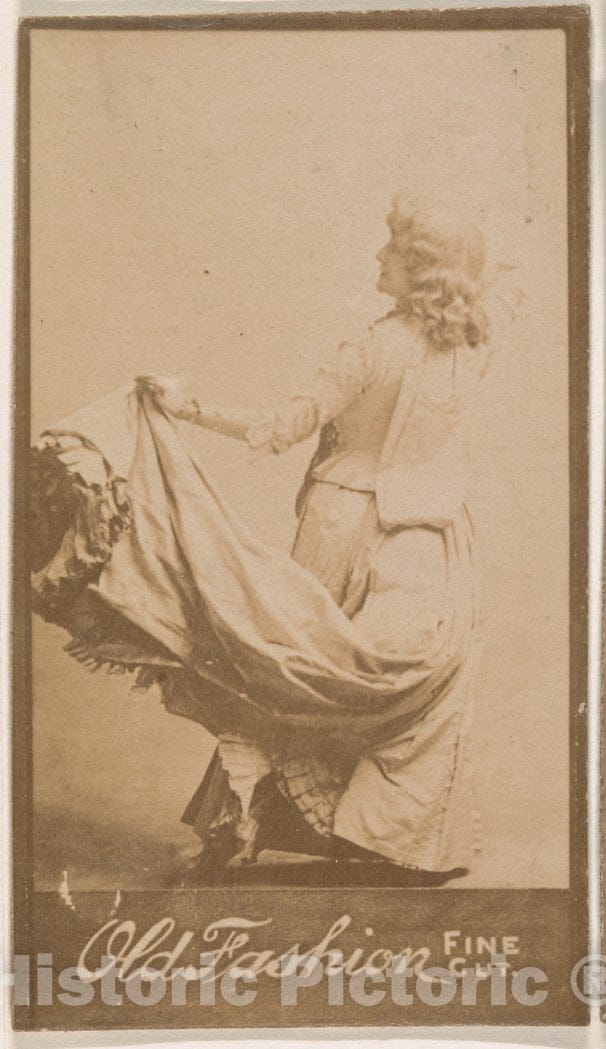 Photo Print : Actress Holding up Part of Costume, from The Actresses Series (N664) Promoting Old Fashion Fine Cut Tobacco : Vintage Wall Art