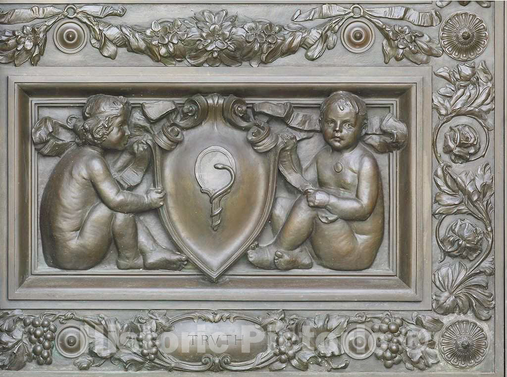 Photo- Exterior View. Detail of Bronze Doors at The Main Entrance with Cherubs Representing Truth (Holding a cartouche with Mirror and a Serpent), by Olin L. Warner 1