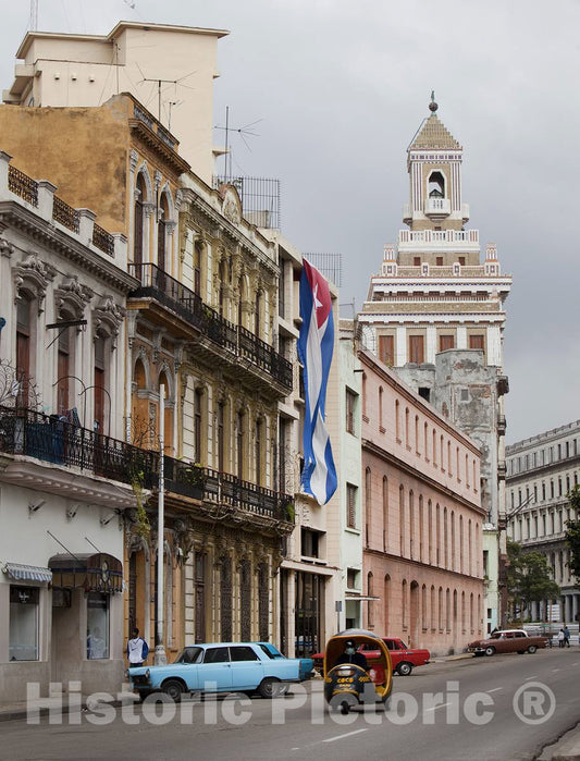 Photo - A Small cab Rides Down The Street in Havana, Cuba. Barcardi Rum Building is The Tall Building in The Background- Fine Art Photo Reporduction