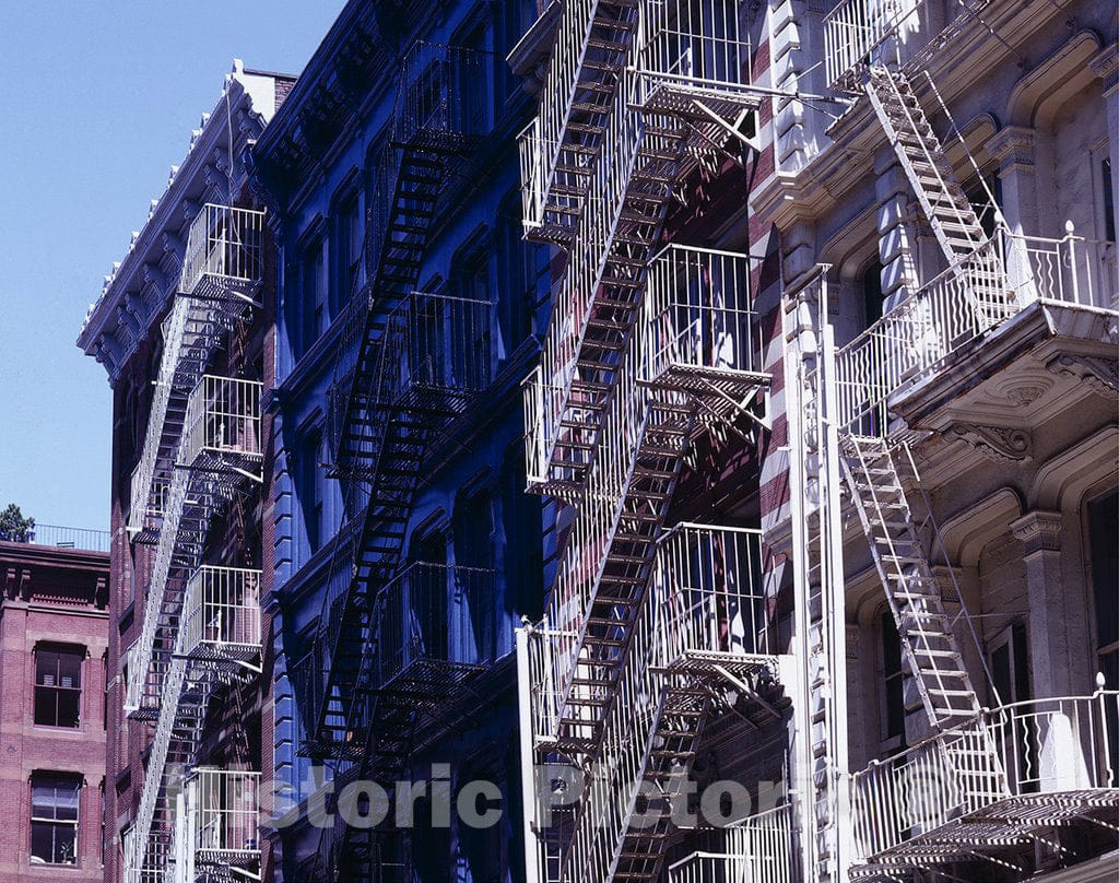 New York, NY Photo - Fire escapes on apartment buildings in Soho, New York, New York