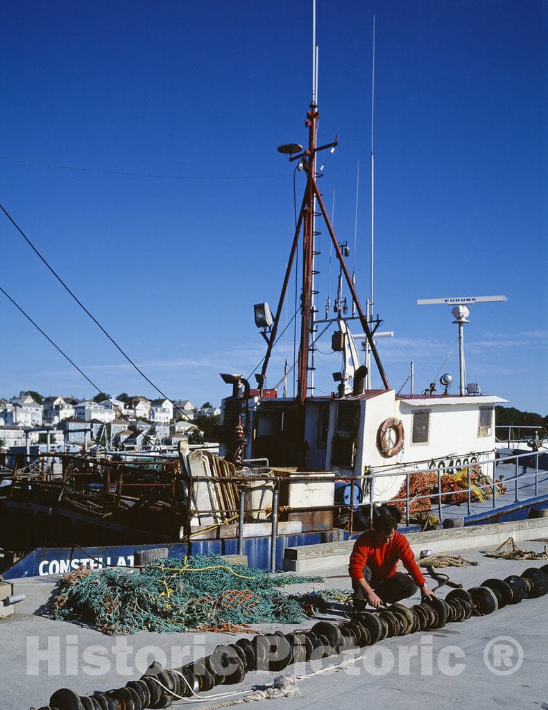 Gloucester, MA Photo - Fisherman Repairs his net in Gloucester, Massachusetts