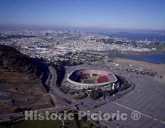 San Francisco, CA Photo - Aerial view of Candlestick Park, home stadium of the San Francisco 49ers National Football League professional team, with downtown in the distance