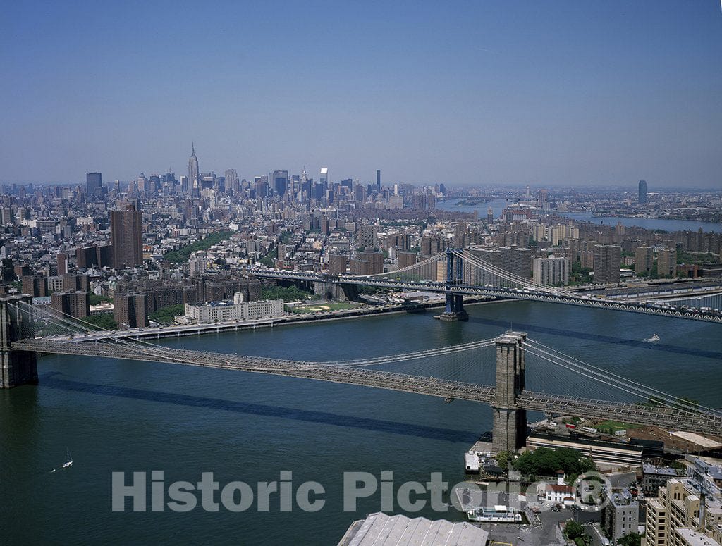 New York, NY Photo - Aerial View of New York City, Looking Toward Brooklyn. The Brooklyn Bridge (Below) and Manhattan Bridge are Shown Crossing The East River