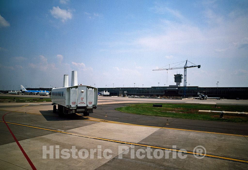 Photo - Mobile lounges That Locals Call People Movers, ferrying Passengers to Their Planes from The Terminal at Dulles International Airport, Chantilly, Virginia