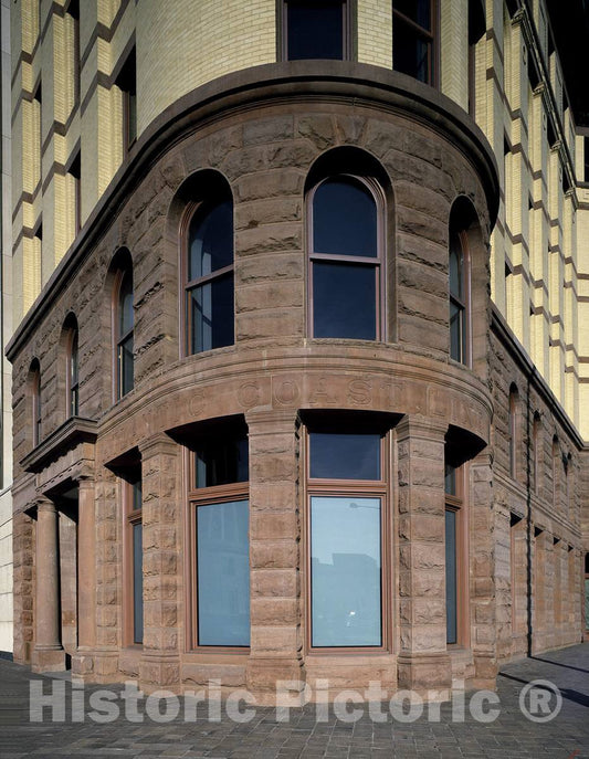 Photo- The facade of the 1893 Atlantic Coast Line (railroad) Building was preserved, and stories added, in the creation of a modern office building in 1995 on Pennsylvania Avenue