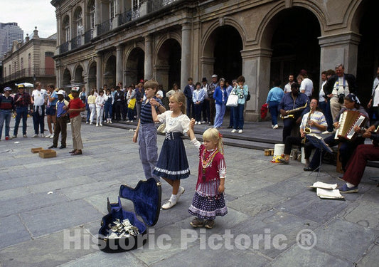 New Orleans, LA Photo - Young street musicians on Jackson Square in French Quarter of New Orleans, Louisiana
