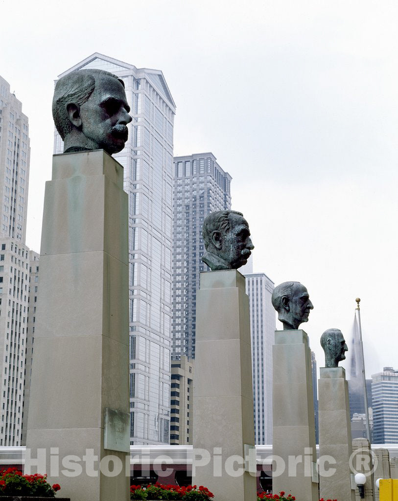Chicago, IL Photo - A row of busts, depicting notable Chicago merchants, added to the entrance of the Merchandise Mart, the world's largest wholesalers' building, in 1953.