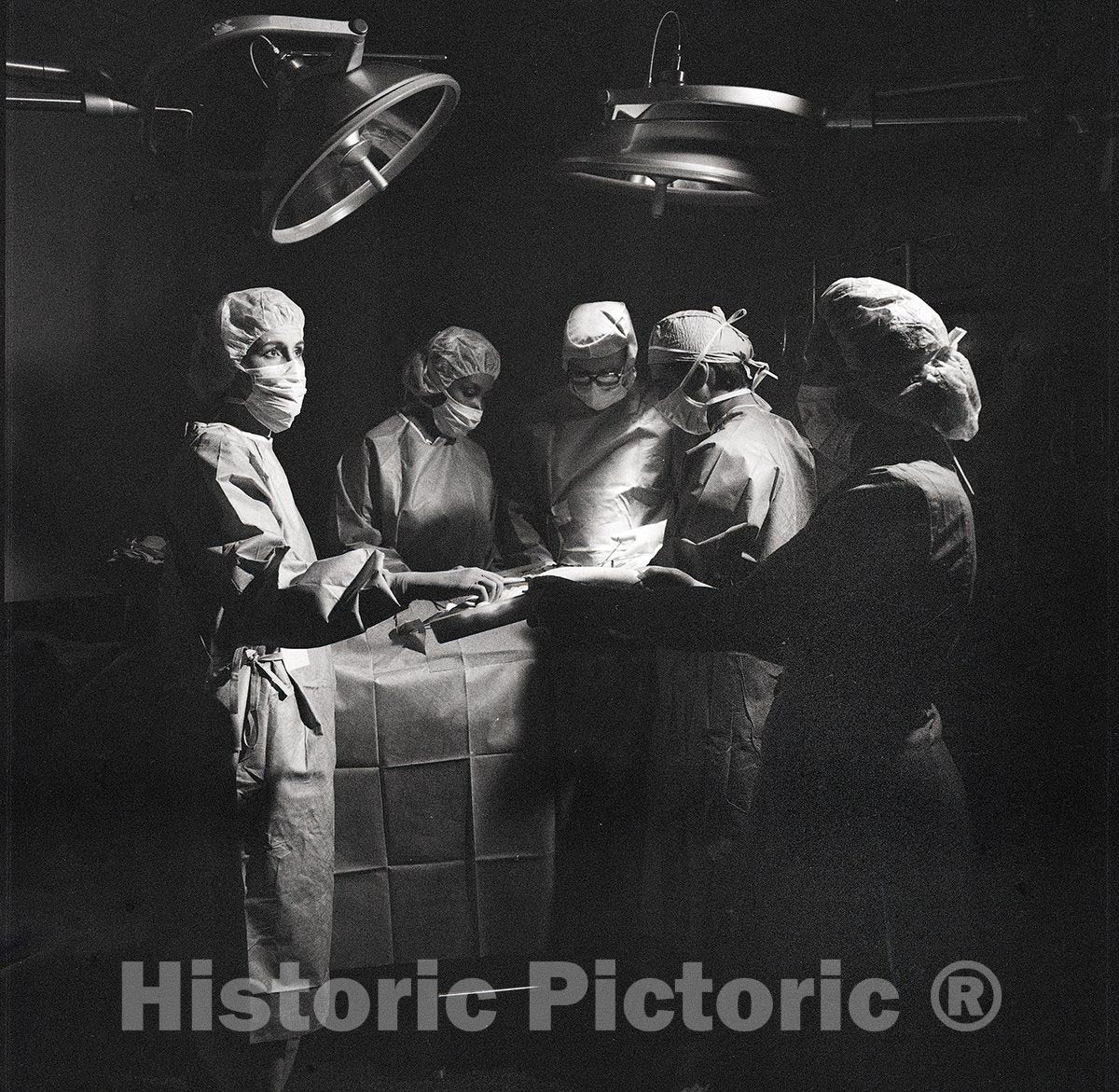 United States Photo - Physicians and Nurses at Work in a Surgical Suite