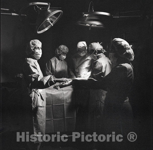United States Photo - Physicians and Nurses at Work in a Surgical Suite