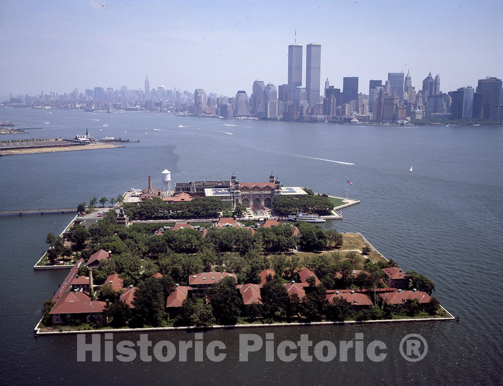 Jersey City, NJ Photo - Aerial View of The Ellis Island Immigration Station, with The World Trade Center Twin Towers, New York City, in The Distance
