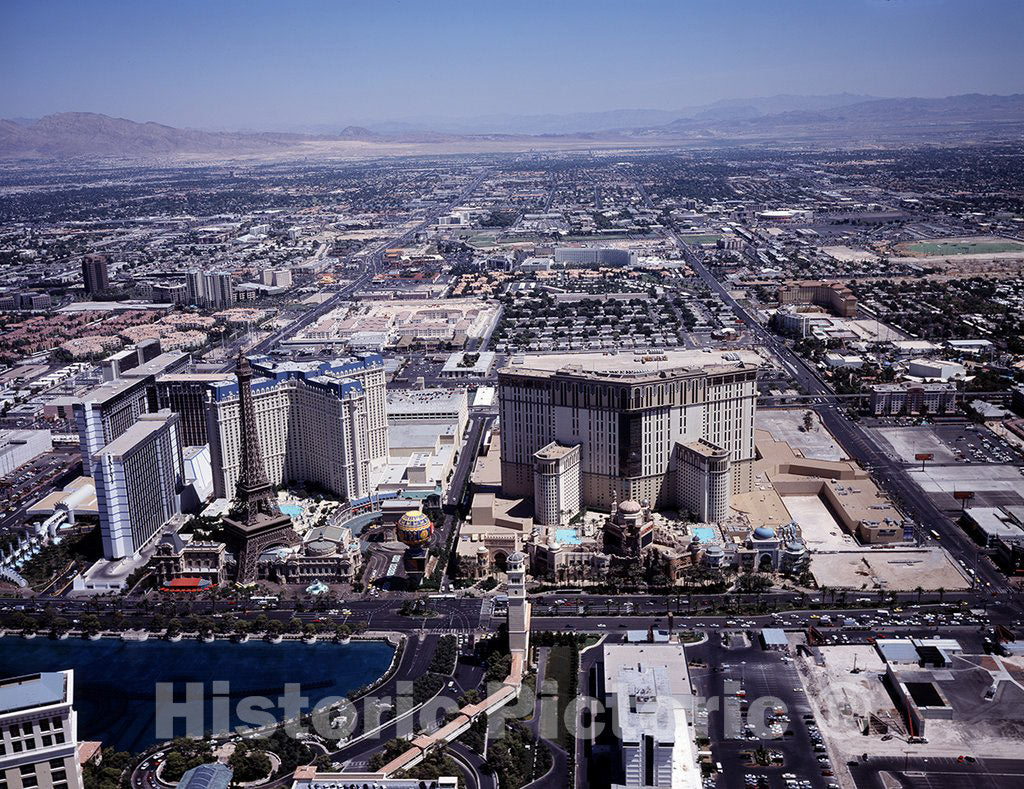 Las Vegas, NV Photo - Aerial view of Las Vegas, Nevada, with a focus on Las Vegas Strip casinos, including the Paris Las Vegas's half-scale replica of the Eiffel Tower