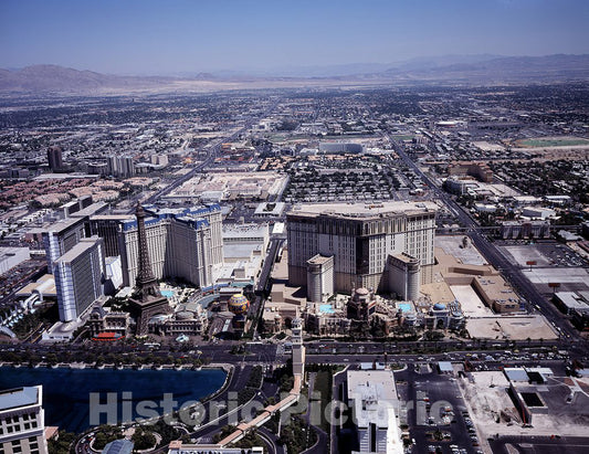 Las Vegas, NV Photo - Aerial view of Las Vegas, Nevada, with a focus on Las Vegas Strip casinos, including the Paris Las Vegas's half-scale replica of the Eiffel Tower