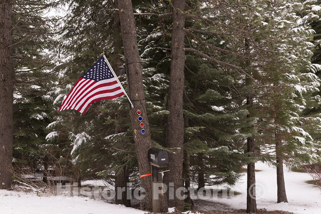California Photo - A Flag and reflectors Provide a Vivid Contrast to The White Background Created by a Sudden Mountain Blizzard Along California Route 36