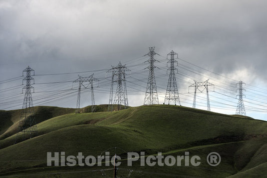 California Photo - Lush green hills frame rows of power lines west of Modesto in California's San Joaquin Valley