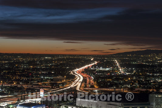 Los Angeles, CA Photo - Dusk skyline view of Los Angeles, California, looking west over the Interstate 10 (Santa Monica) freeway toward the setting sun