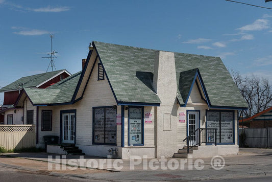 Photo- One of The Old, architecturally Iconic, English Cottage-Style Pure Oil Gasoline Stations with steep pitched Roofs That Once Dotted The American Landscape 1