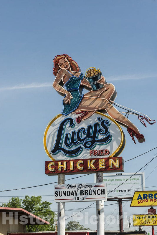 Austin, TX Photo - Provocative neon Sign at a Lucy's Fried Chicken Location on Burnet Road in Austin, Texas