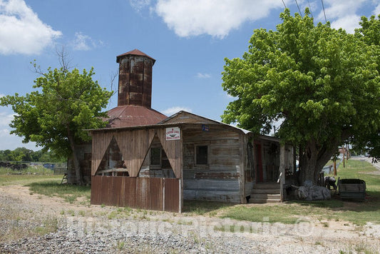Grand Saline, TX Photo - An old cotton gin in the town of Grand Saline in Van Zandt County in East TX