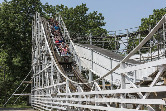 Huntington, WV Photo - Riders enjoy (or endure) a spin on the Big Dipper roller-coaster at Camden Park, an amusement park on the outskirts of Huntington, West Virginia
