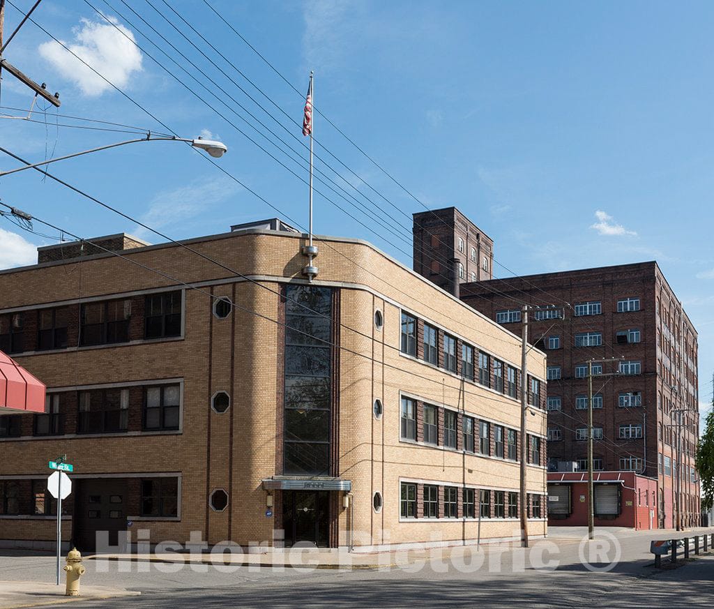 Photo- The headquarters building of the Bloch Brothers Tobacco Company (also known as Helme Tobacco Company), Water Street, next to the company's factory in Wheeling, West Virginia
