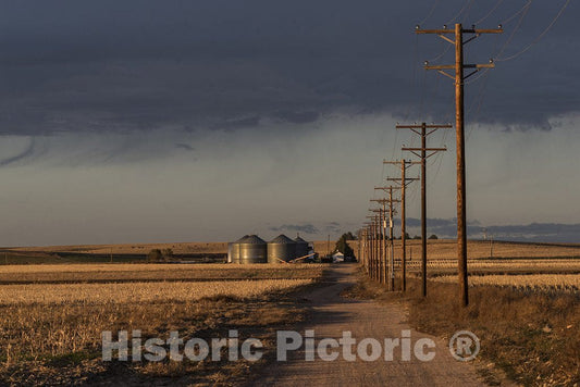 Julesburg, CO Photo - Dusk approaches along a dusty road in Sedgwick County, near Julesburg, CO