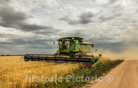 Photo - A harvesting Combine Kicks up dust During its Work in Field Near The Tiny Town of Carpenter in Southeast Wyoming's Laramie County- Fine Art Photo Reporduction