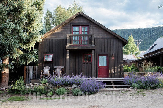 Photo - Flowers outside a large cabin in Crested Butte, a town heavily populated during ski season located high in the Rocky Mountains in Gunnison County, Colorado