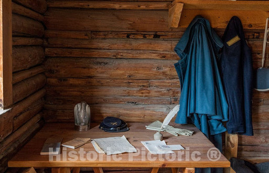 Photograph- An everyday soldier's garb and possessions inside a cabin at Fort Caspar, a reconstructed 1865 military post located at a North Platte River crossing on the Oregon, Mormon Pioneer