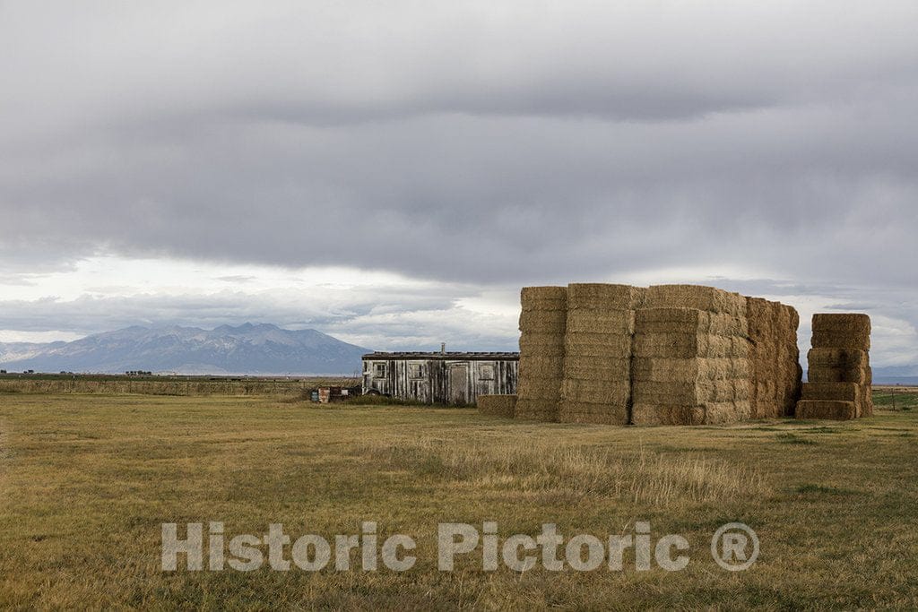 Alamosa County, CO Photo - Hay Bales and an Old Storage Shack in Alamosa County, Colorado.