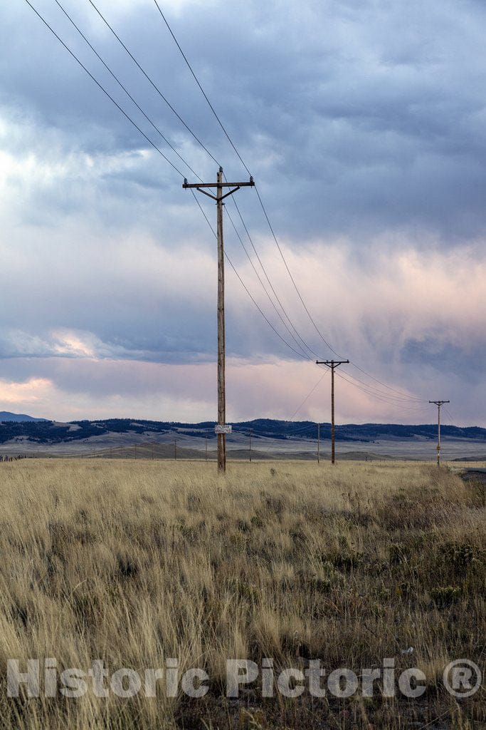 Jefferson, CO Photo - Dusk Falls Over a line of Telephone Poles Near Jefferson, Colorado.