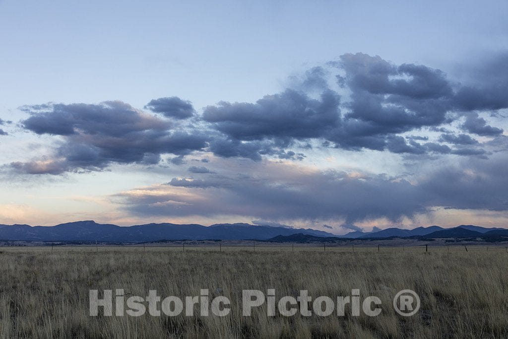 Como, CO Photo - Dark clouds rim the horizon in Park County, Colorado, near Como.